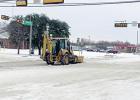 City of Forney Public Works Department Working to Clear Snow From Roadway